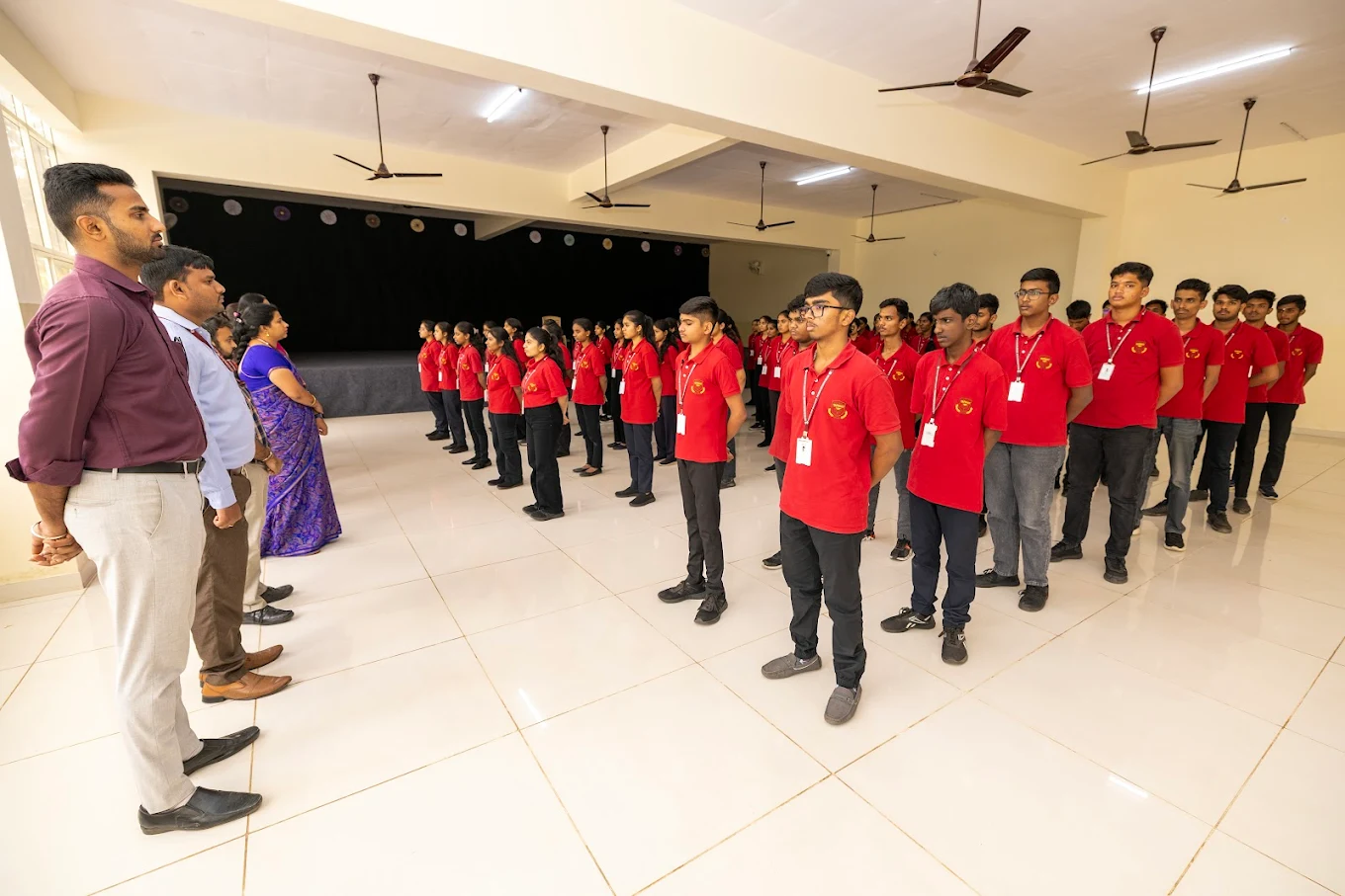 Teacher at blackboard with attentive students