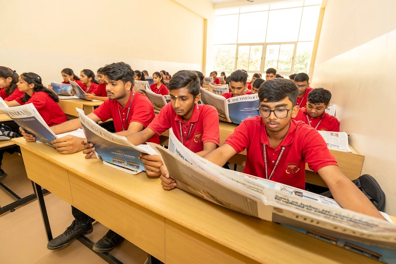 Teacher at blackboard with attentive students
